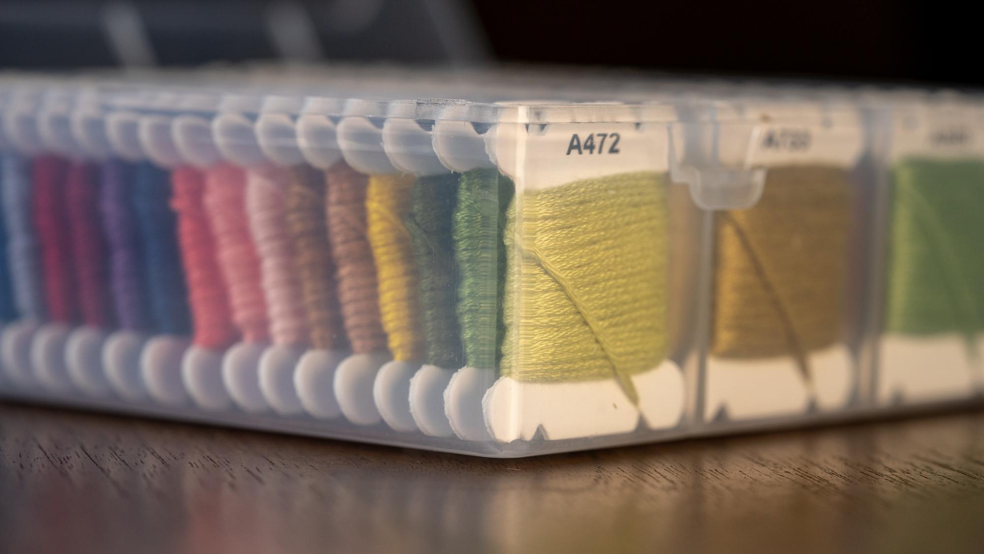 Sample set of embroidered swatches on table